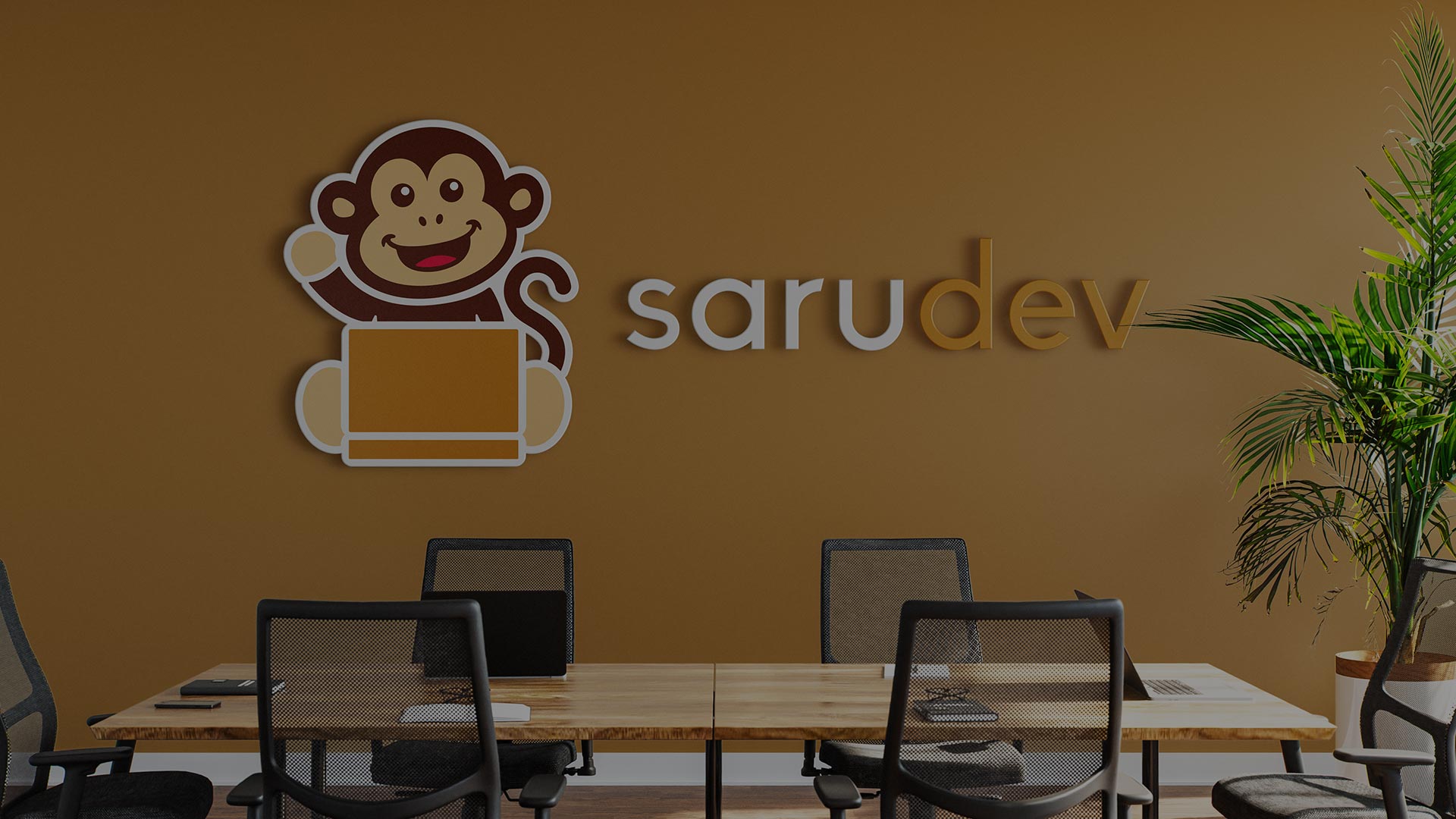Photo of Sarudev's logotype on a conference room wall